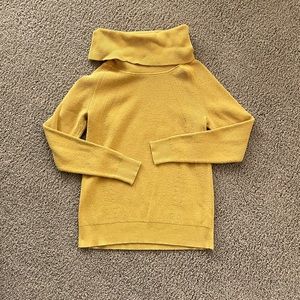 Yellow turtleneck sweater